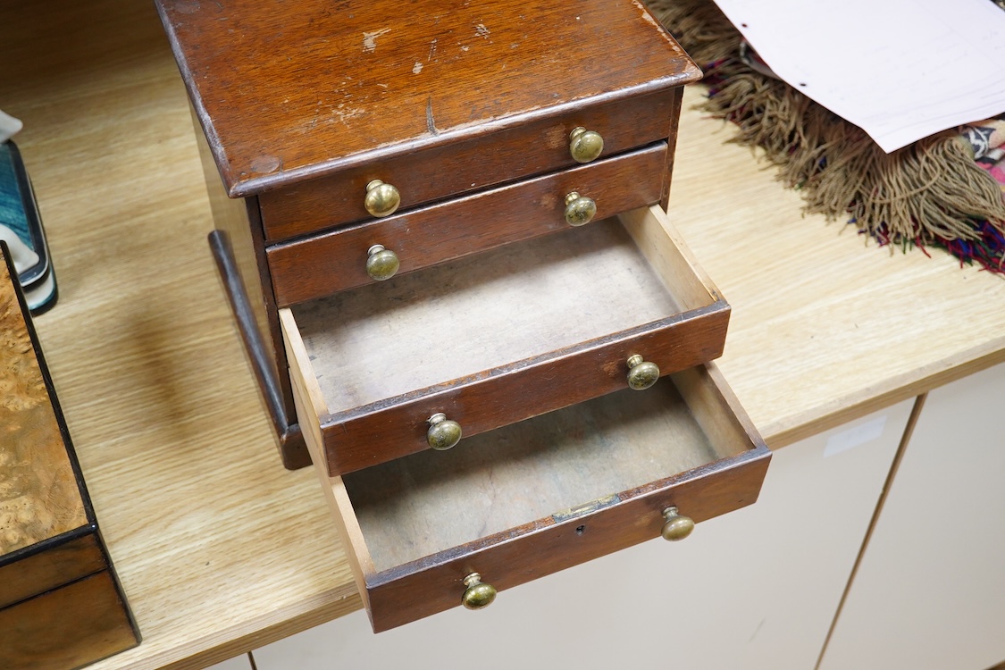 A 19th century mahogany tabletop chest of four drawers, 24cm high